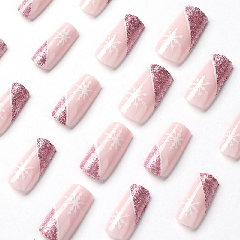 Artful Nail Extensions with Festive Glitter and Snowflake Design Kalsten