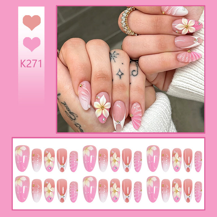 Nail art set with filigree flower patterns and sparkling accents Kalsten