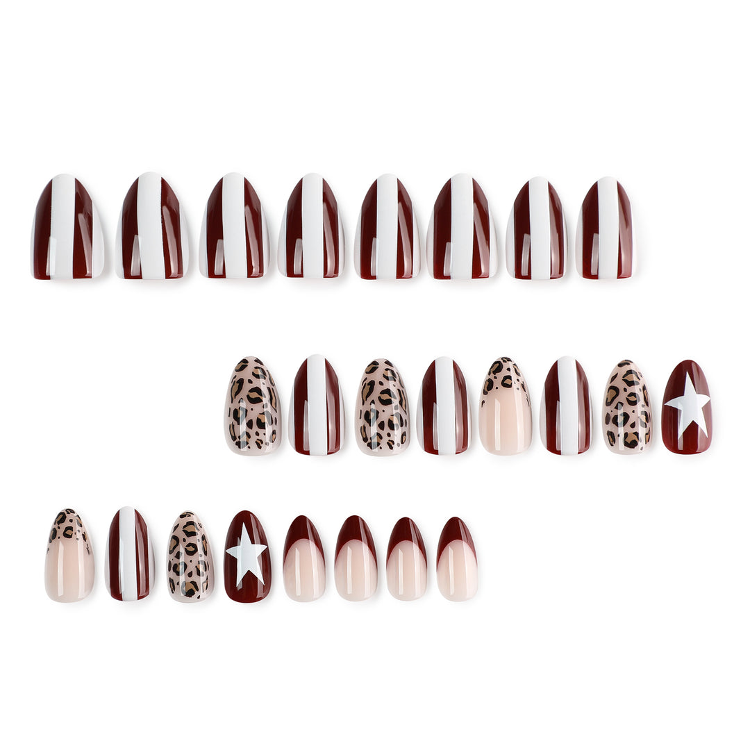 Artful stiletto nails with leopard pattern and elegant glitter decoration Kalsten