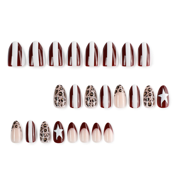 Artful stiletto nails with leopard pattern and elegant glitter decoration Kalsten