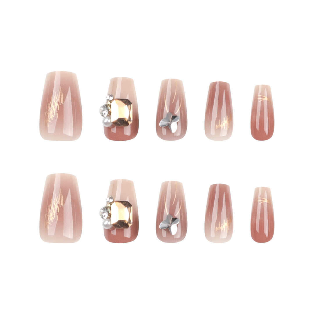 Artificial nail art with elegant jewelry accents Kalsten