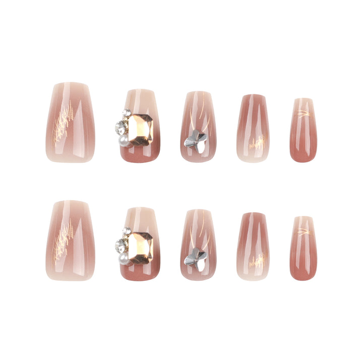 Artificial nail art with elegant jewelry accents Kalsten