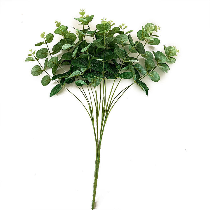 Artificial flowering branch with lifelike leaves and delicate flowers