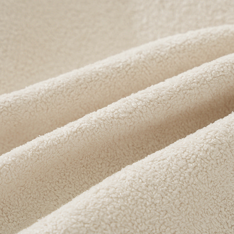 Round floor seat pouf made of teddy plush with a shape-retaining padded core Kalsten