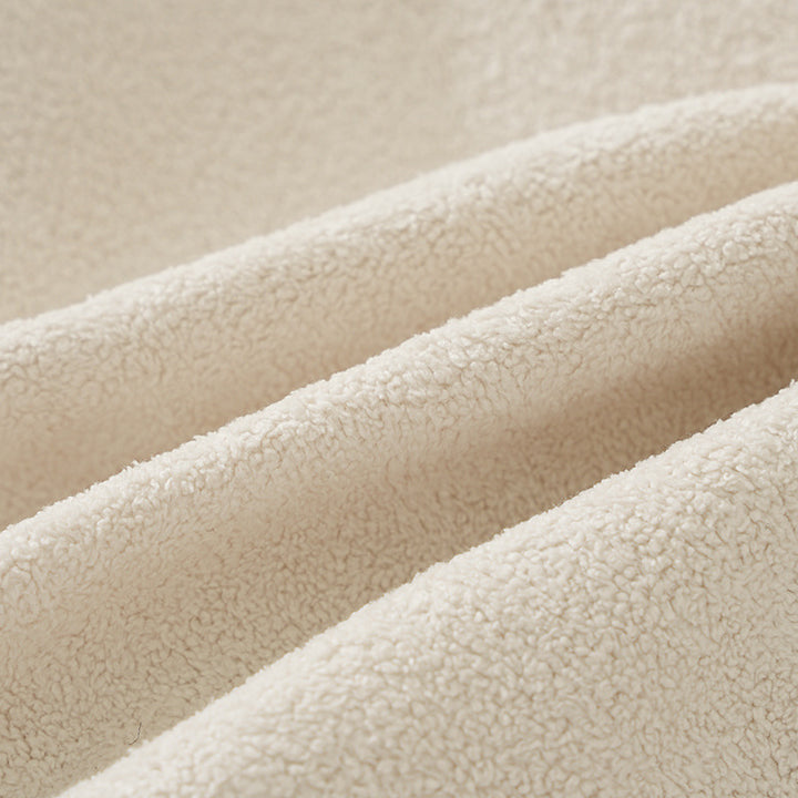 Round floor seat pouf made of teddy plush with a shape-retaining padded core Kalsten