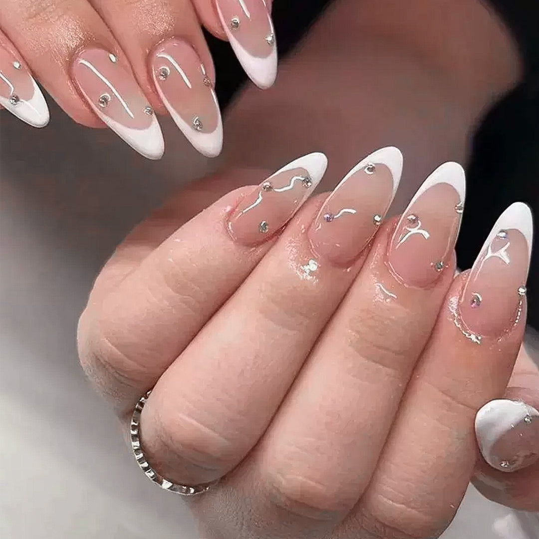 Elegant French Nail Art with Rhinestone Decorations Kalsten