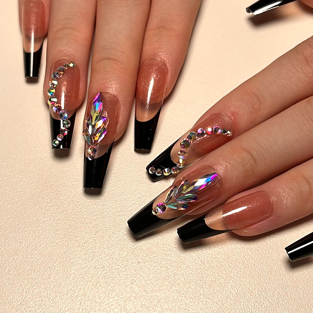 Artistic stiletto nails with glitter embellishments Kalsten