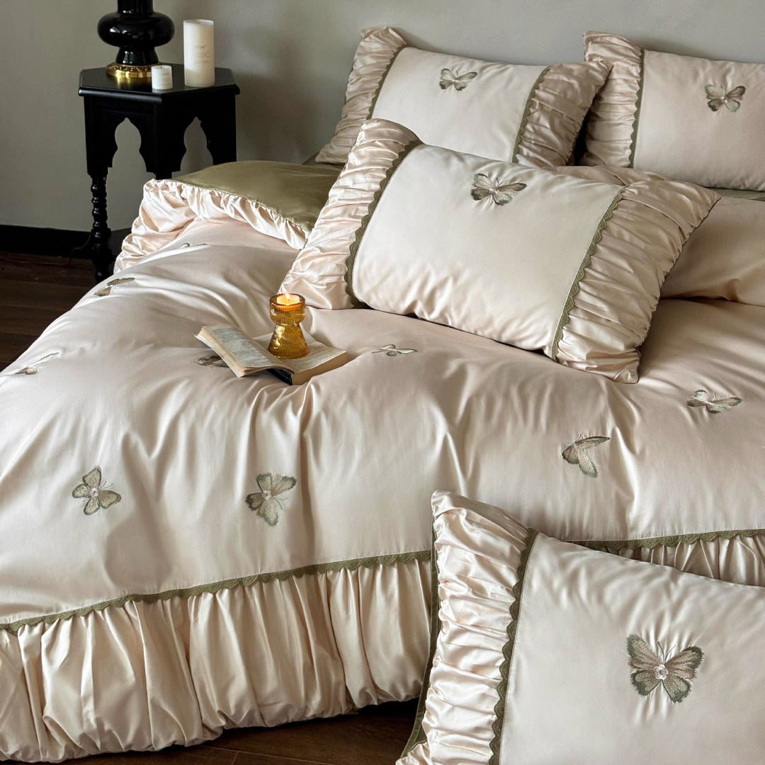 Elegant bedding set made of cotton satin with embroidered butterflies and pleated bed skirt