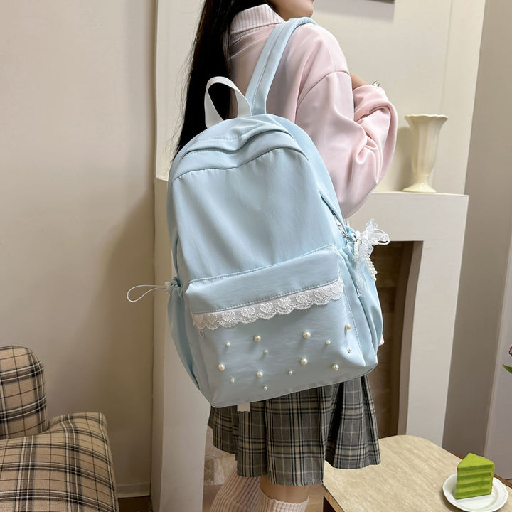 Backpack with elegant pearl applications and intricate design Kalsten