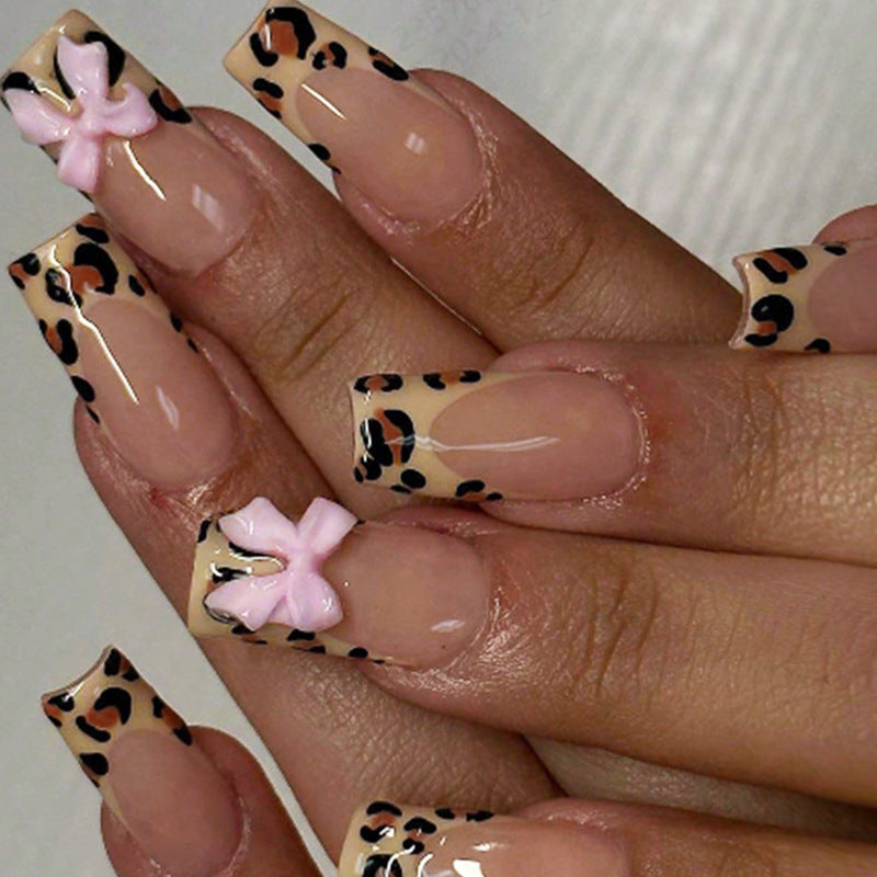 Decorative Stiletto Press-On Nail Art with Animal Print and Bow Accents kalsten