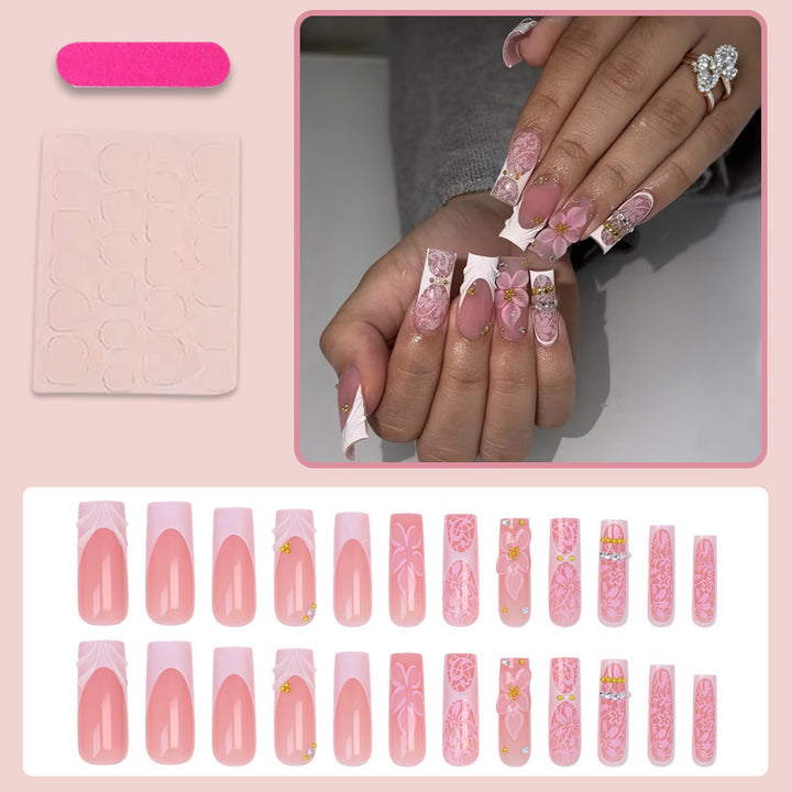Artificial nail set with floral designs and sparkling accents Kalsten
