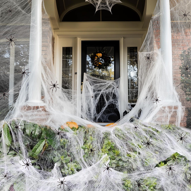 Decorative spider web with artificial spiders