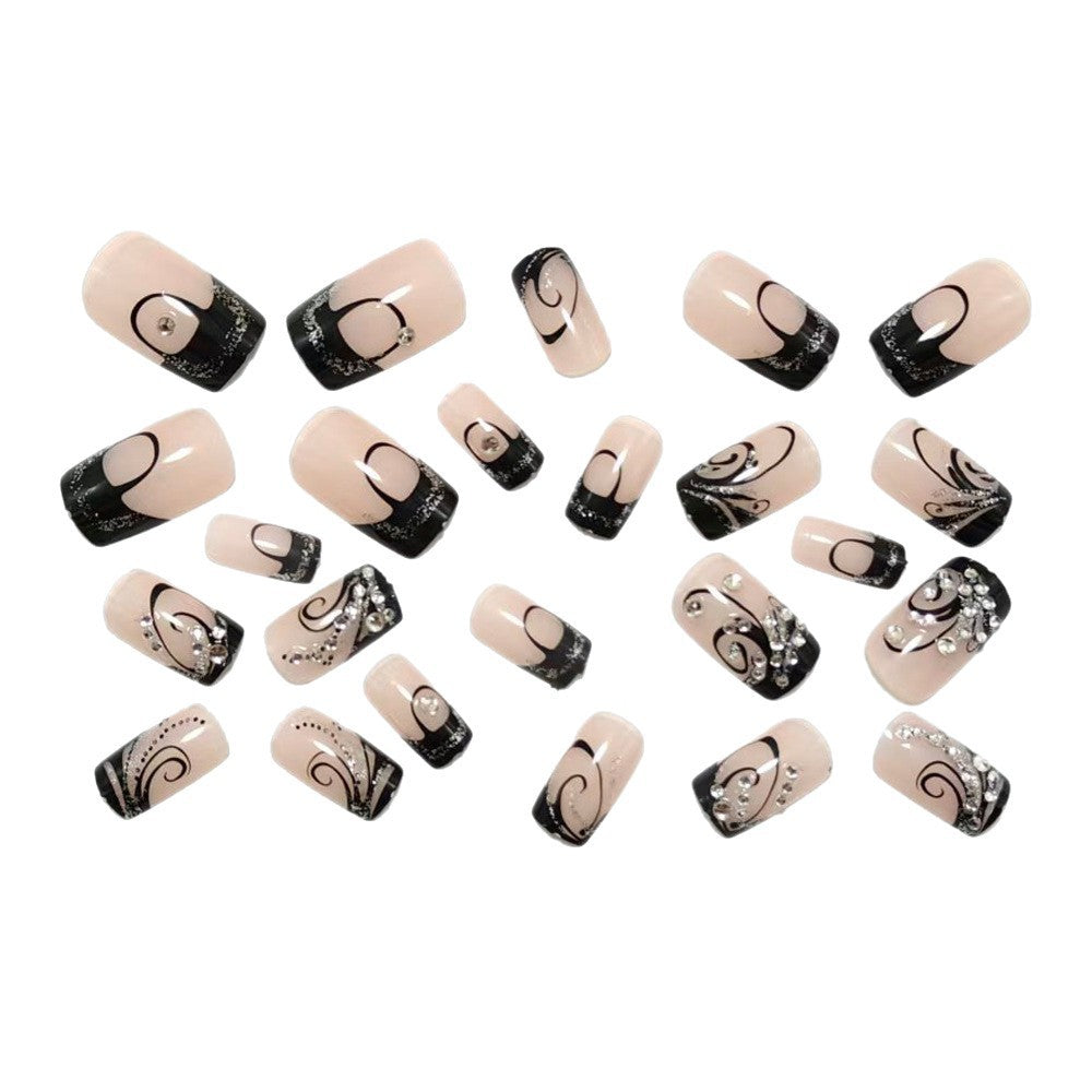 Artificial nails in elegant black-and-white design with glitter applications Kalsten