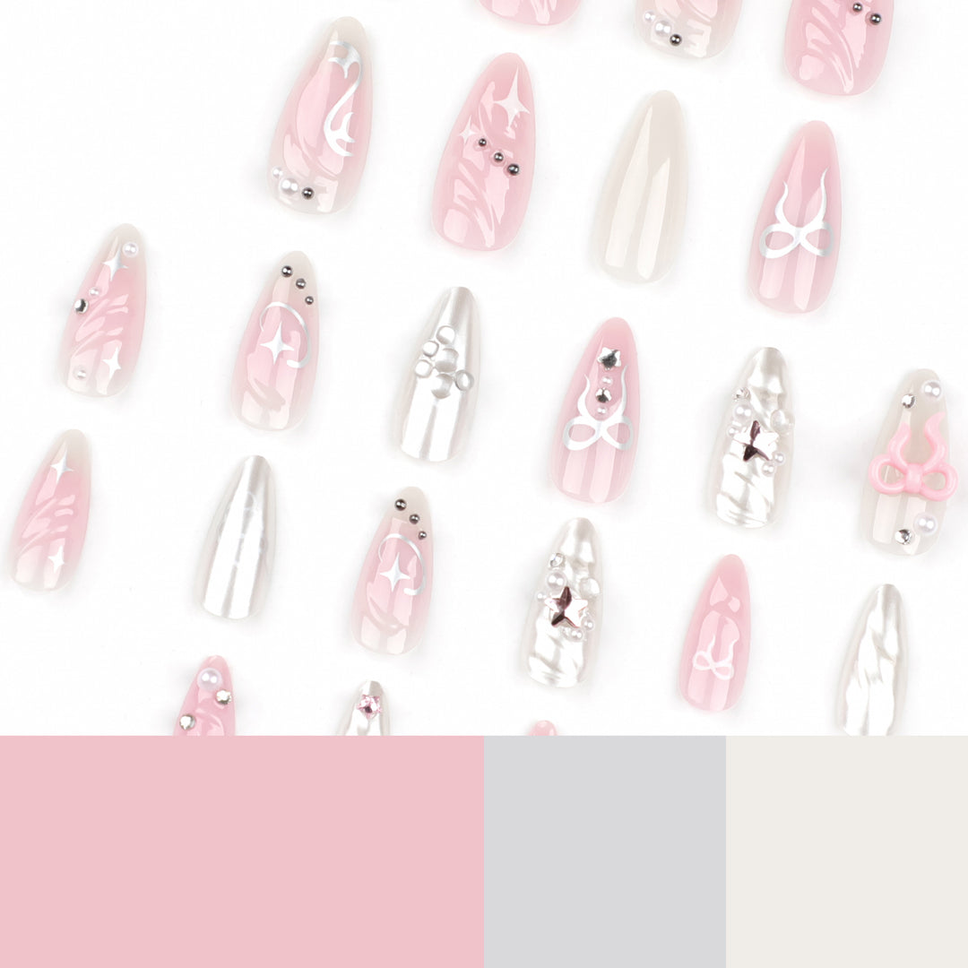 Artful stiletto nails in an elegant design with creative embellishments Kalsten