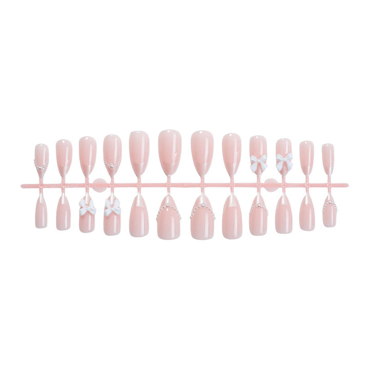 Decorative Press-On Nail Art Set with Elegant Bow and Pearl Accents kalsten