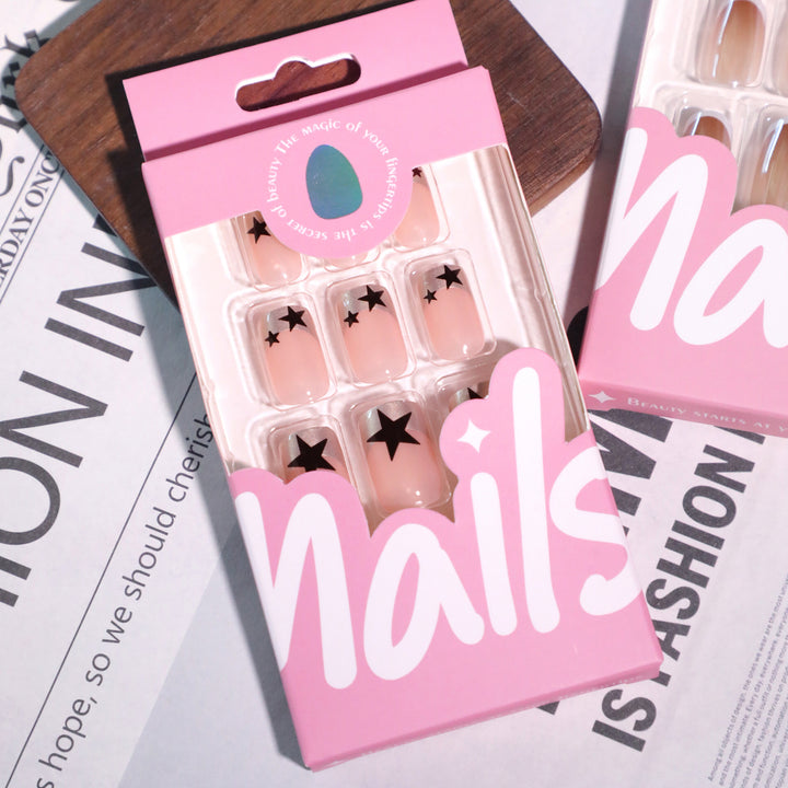 Sparkling nail art with stars and glitter accents Kalsten