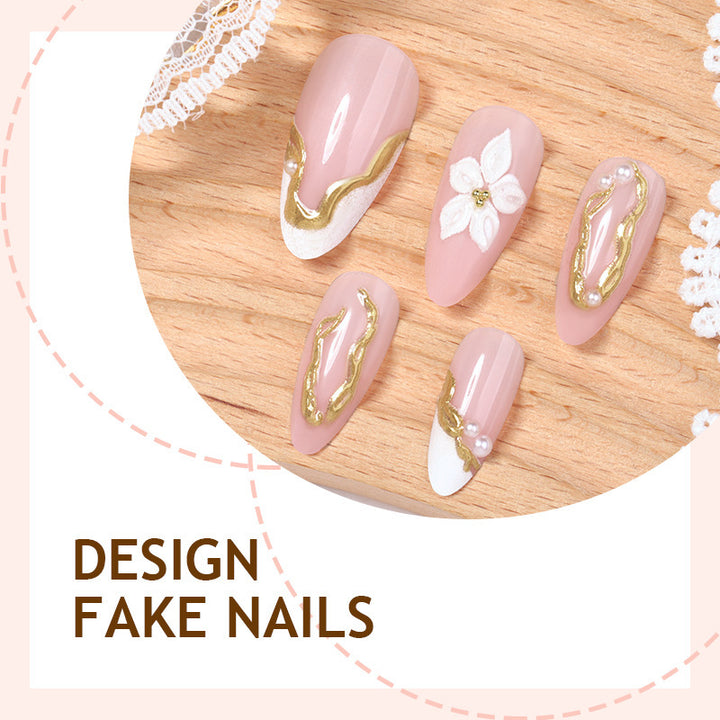 Artificial nail set with elegant gold accents and floral decorations Kalsten