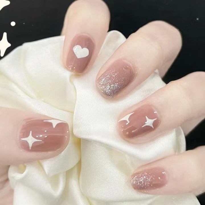 Artful nail art with heart and star design Kalsten