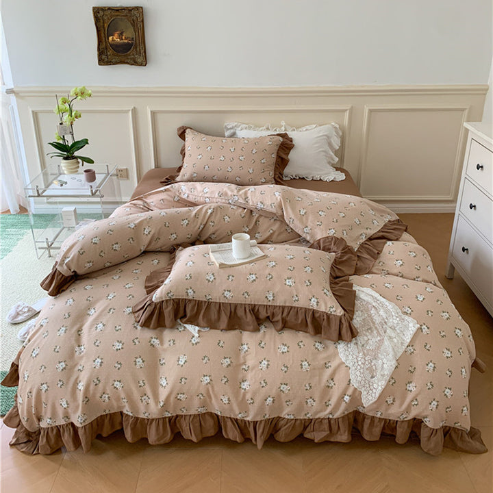 Romantic bed linen complete set made of cotton percale with delicate floral print, ruffle trim, and silky-matte finish