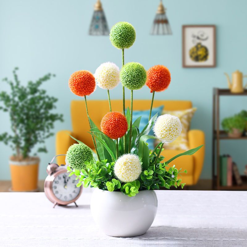 Artificial Floral Arrangement in Modern Ceramic Vase