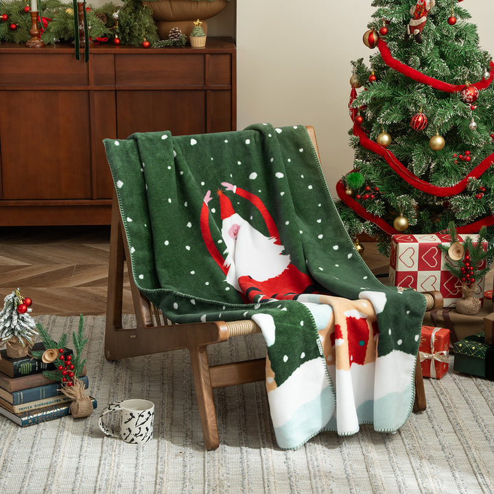 Soft Christmas fleece blanket with gift and gingerbread motif Kalsten