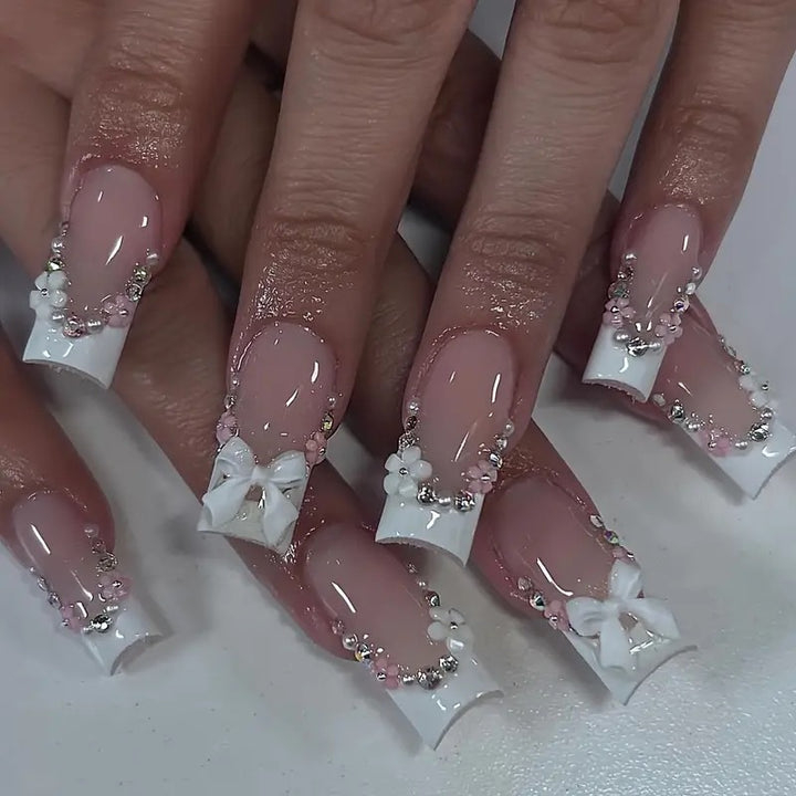 Artificial nails with elegant 3D bows and glitter accents Kalsten