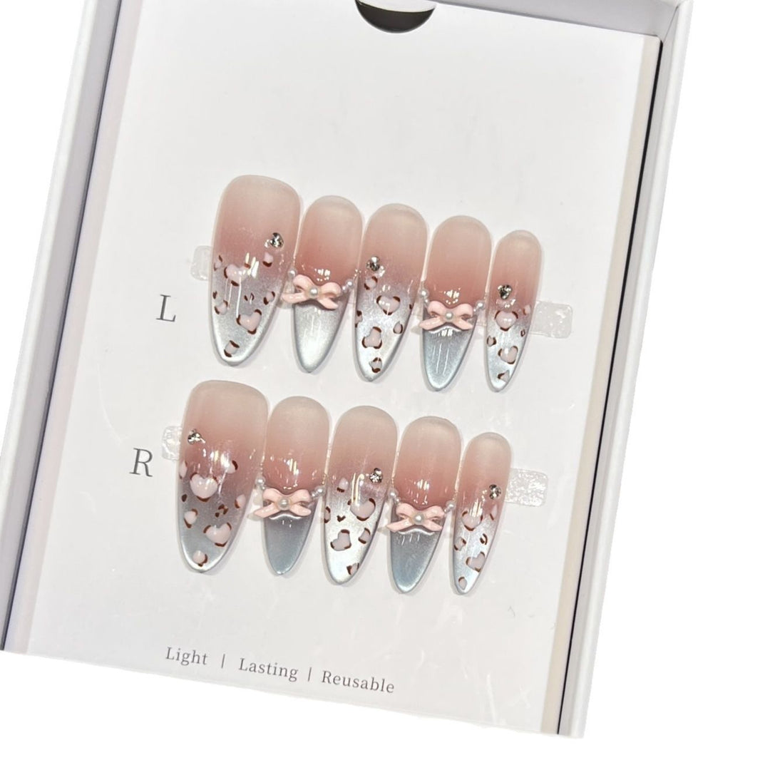 Decorative Press-On Nail Design with Bow Accents Kalsten