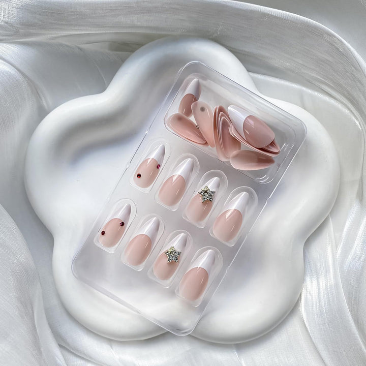 Artificial nail set with elegant French tips and sparkling accents Kalsten