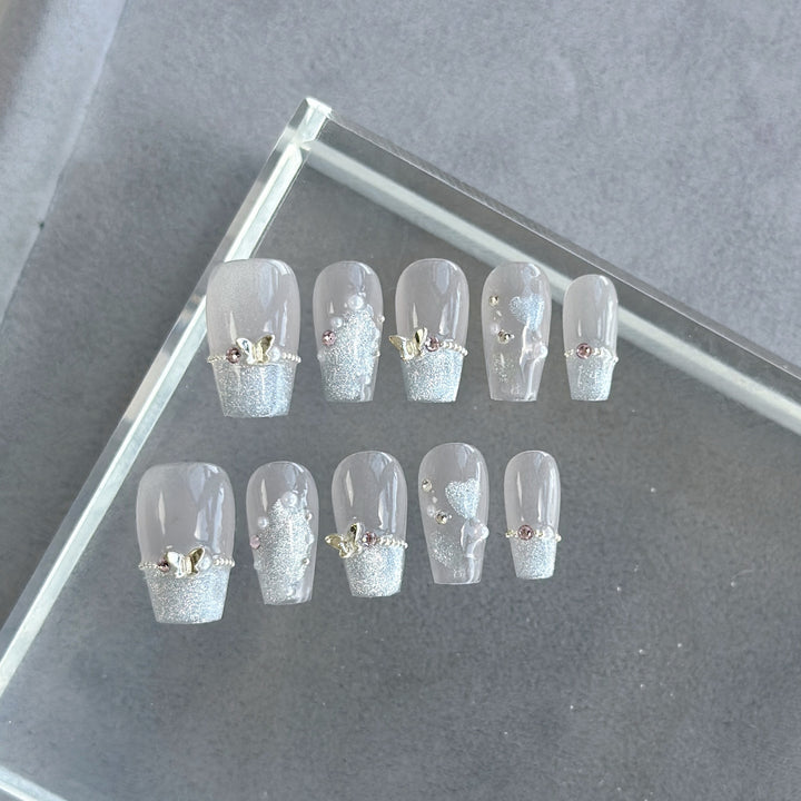 Artistic Press-On Nail Art Set with Heart and Celestial Designs
