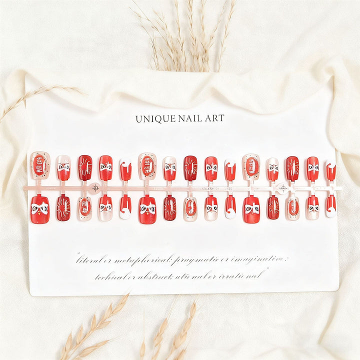 Fake nail set with unique animal motifs and elegant accents Kalsten