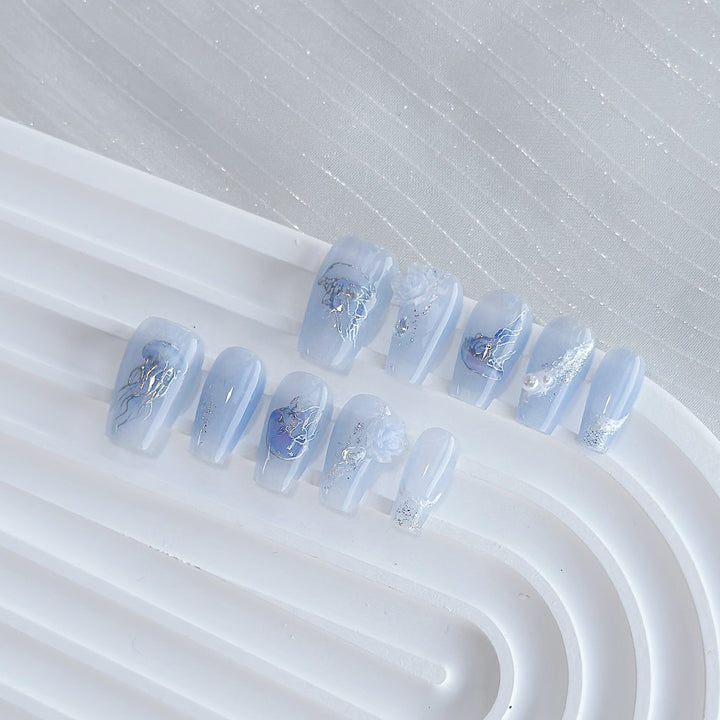 Artistic Press-On Nail Art Set with Heart and Celestial Designs
