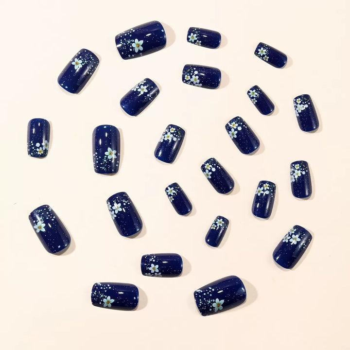 Acrylic nail set with elegant flower design and glitter accents Kalsten