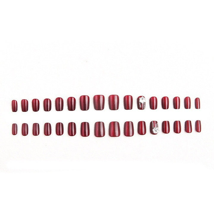 Artificial nail set with sparkling accents and glamorous design Kalsten