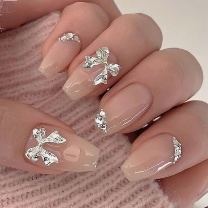 Artful Nail Extensions with Shiny Accents Kalsten