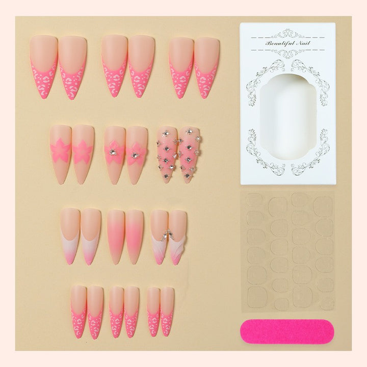 Nail art set with elegant floral embellishments and glamorous accents Kalsten