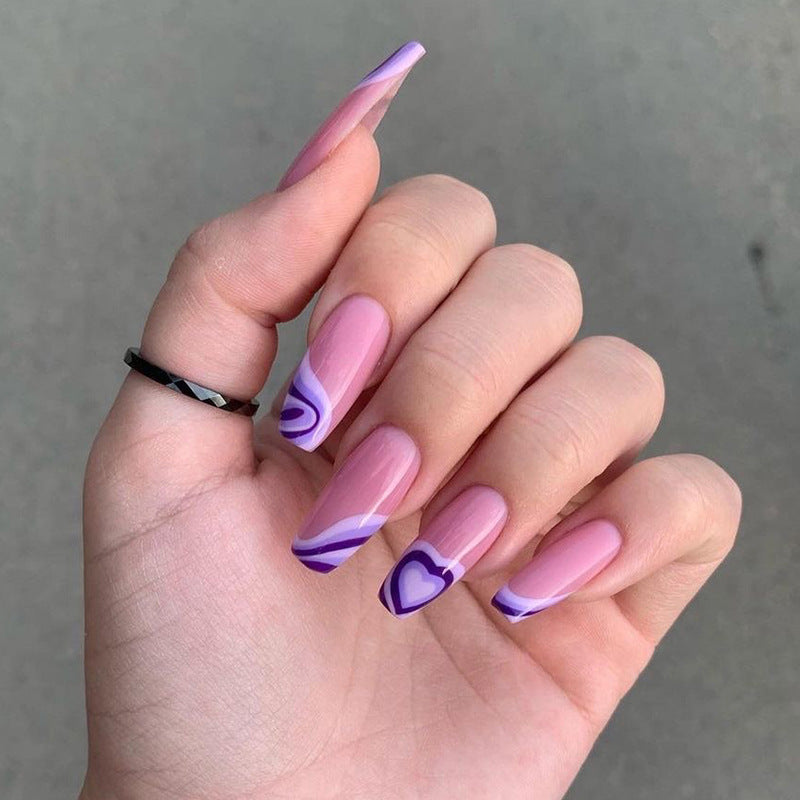 Artistic acrylic nails with creative heart and wave patterns Kalsten
