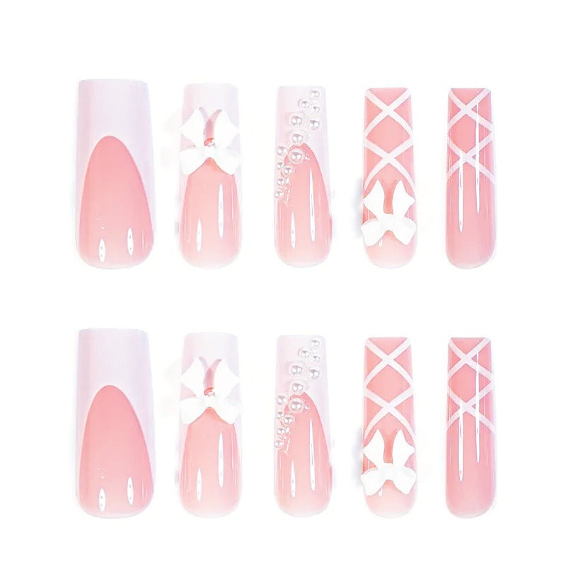 Artificial nail set with elegant 3D bows and pearl embellishments Kalsten