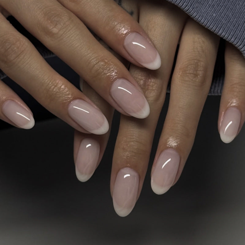 Elegant stiletto nails with classic French tip Kalsten