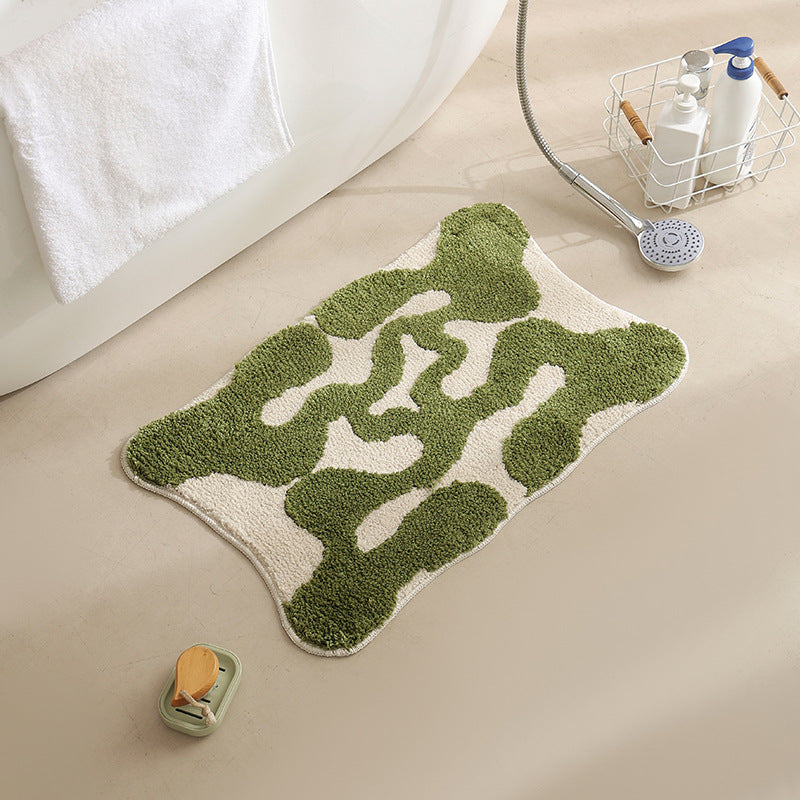 Hand-tufted bathroom bath mat with non-slip backing and textured square relief Kalsten