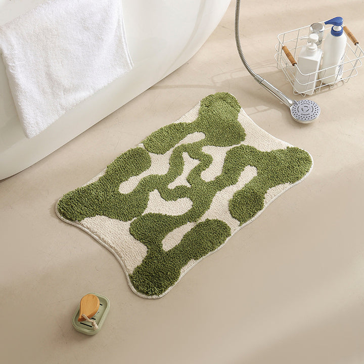 Hand-tufted bathroom bath mat with non-slip backing and textured square relief Kalsten