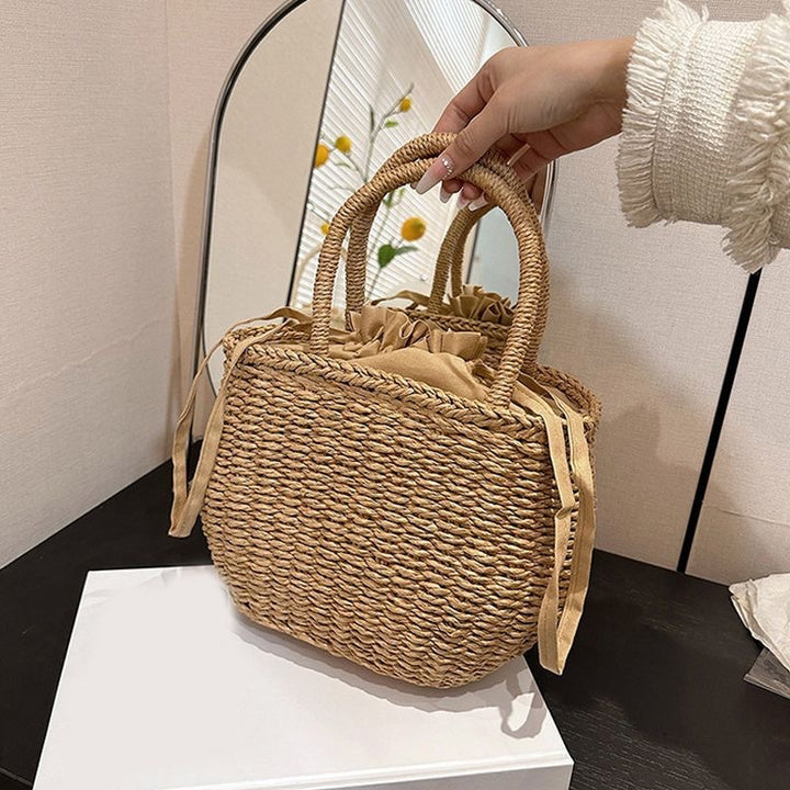 Handwoven basket bag with elegant bow Kalsten
