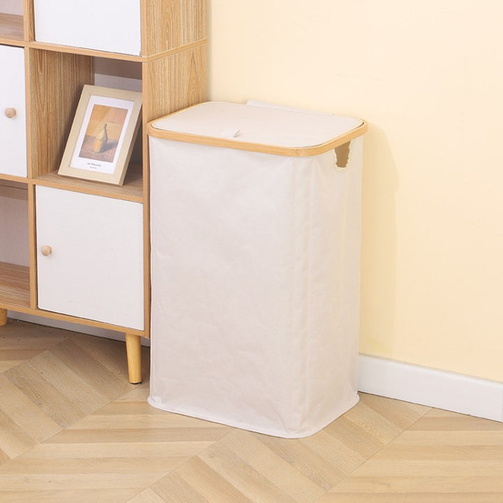 Stylish laundry basket with wooden lid Kalsten