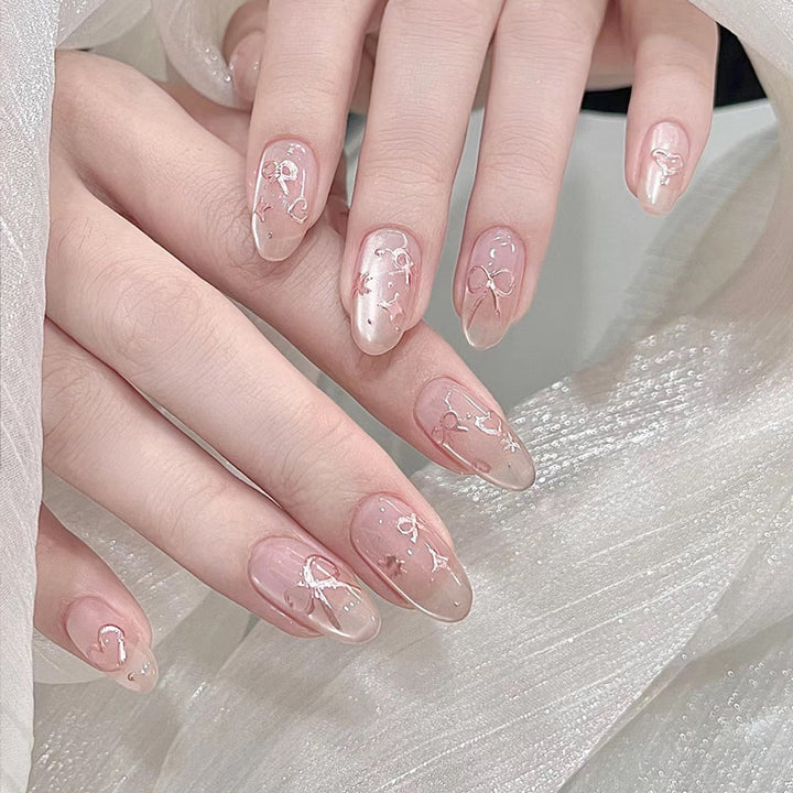 Elegant Artistic Press-On Nail Art with Bow & Heart Designs Kalsten