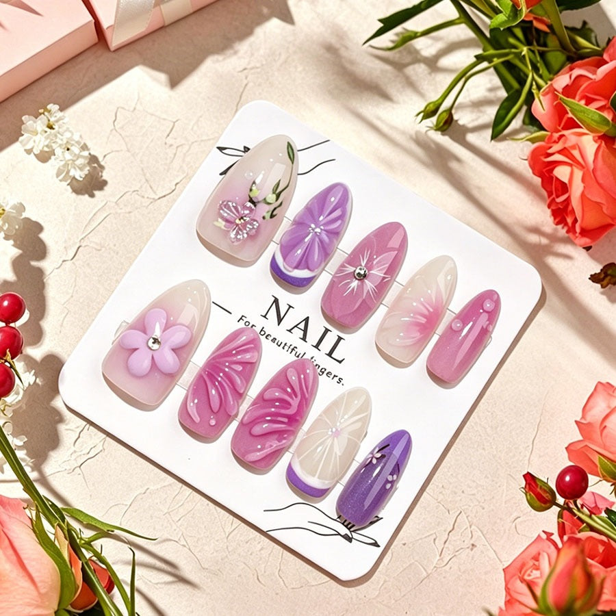 Decorative artificial nails with floral designs and glitter accents Kalsten