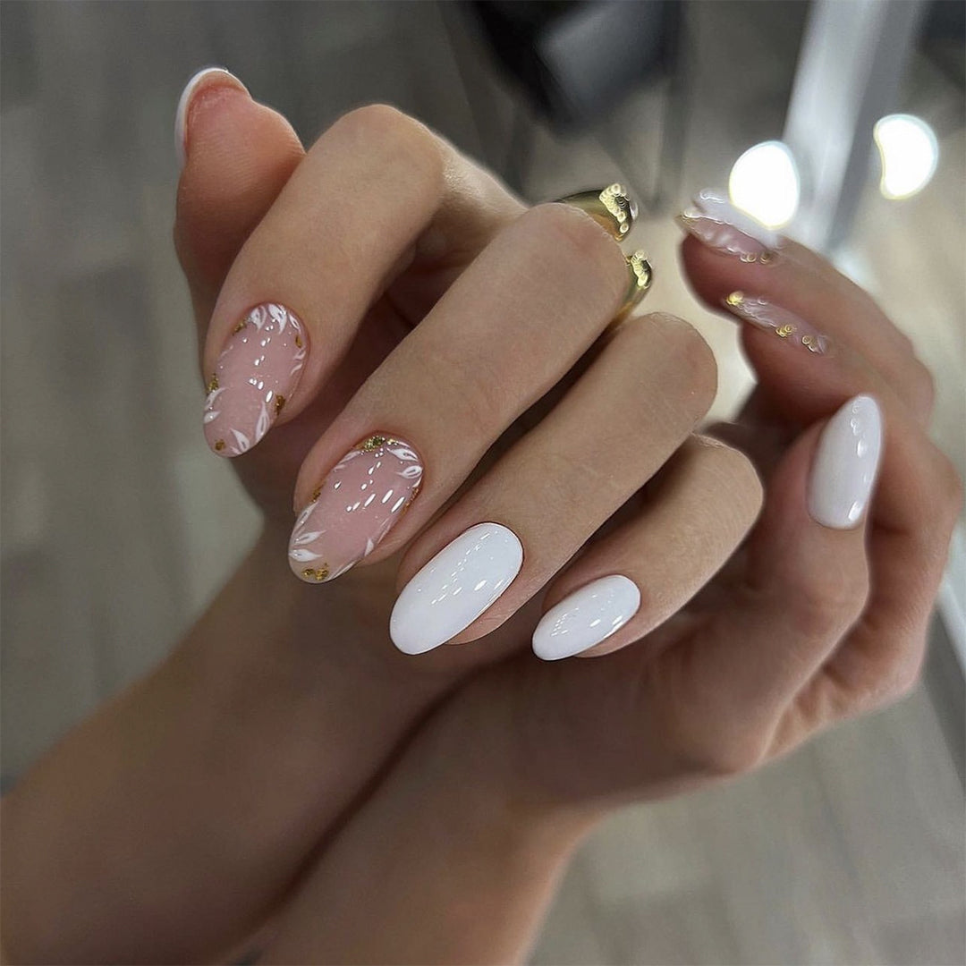 Artistic nail designs with glitter and floral accent Kalsten