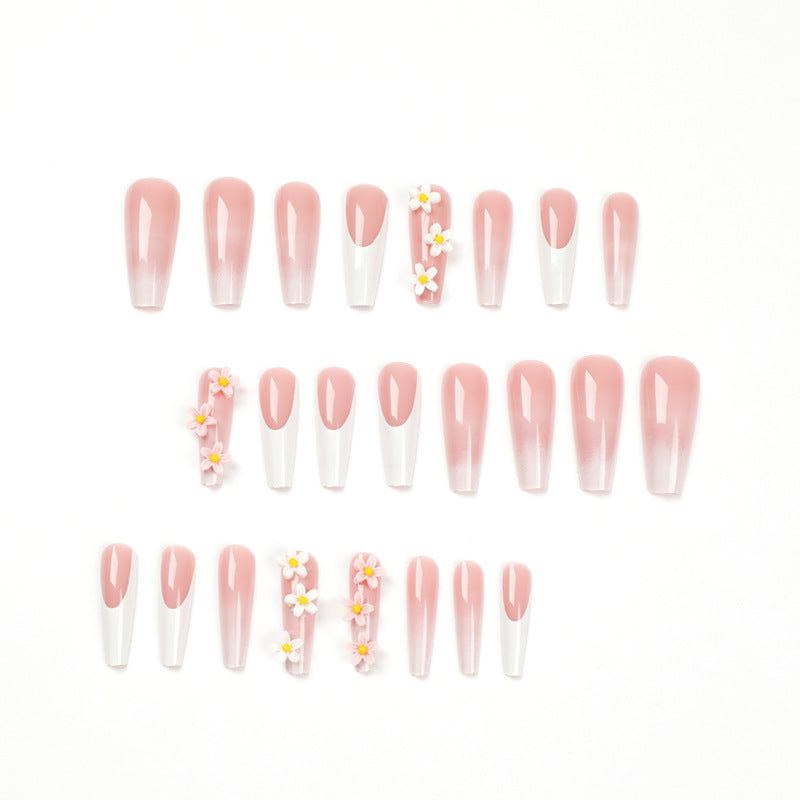 Artful nail extensions with elegant gradient and creative floral accents Kalsten