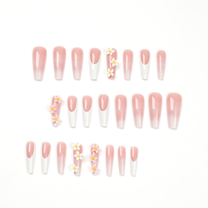 Artful nail extensions with elegant gradient and creative floral accents Kalsten