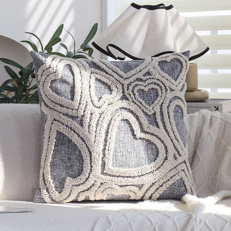 Square cushion cover with three-dimensional looped heart relief made of soft bouclé mix Kalsten