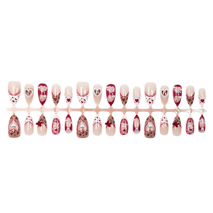 Nail set with romantic heart and bow decorations Kalsten