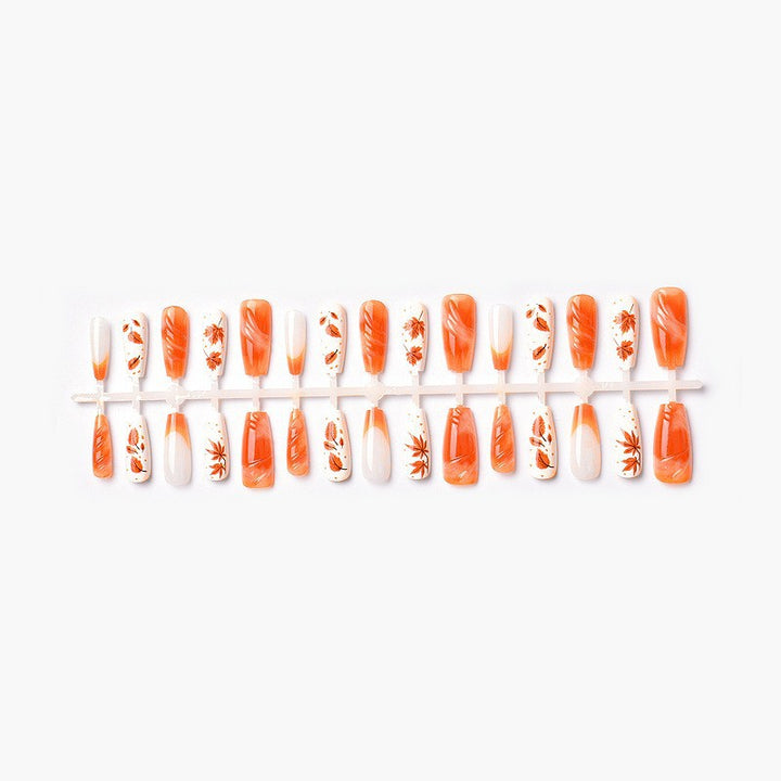 Acrylic nail set with elegant autumn motifs and shiny accents Kalsten